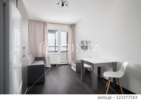 An Elegant Stylish Modern Living Space Featuring a Chic Minimalist Design Approach 122377583