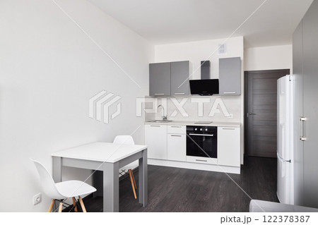 Explore the stunning modern minimalist kitchen design tailored for contemporary living spaces 122378387