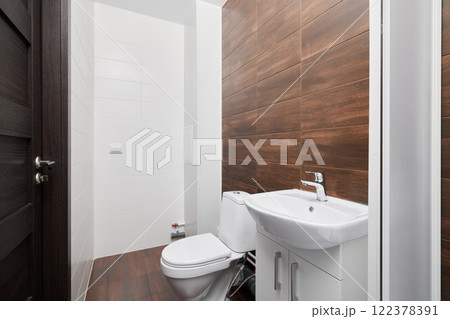 Modern Bathroom Design Featuring Wood Accents Along With Clean Lines Crafted for Aesthetics 122378391