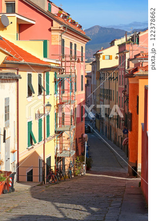 House and street in Liguria. City buildings on sunny day. Travelling, Italy attractions and holidays House and street in Liguria. City buildings on sunny day. Travelling, Italy attractions and holidays 122378662