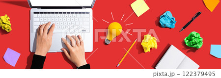 Laptop Computer with a light bulb 122379495