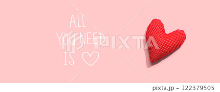 All you need is love message with a red heart cushion All you need is love message with a red heart cushion 122379505