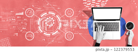 Future technology concept with person using a laptop 122379553