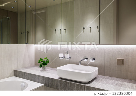 A Stylish and Modern Bathroom infused with a Minimalist Design aesthetic and Natural Touch 122380304