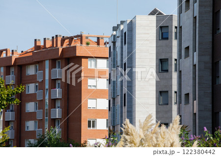 Overview of buildings with individual dwellings for private use in a city. 122380442