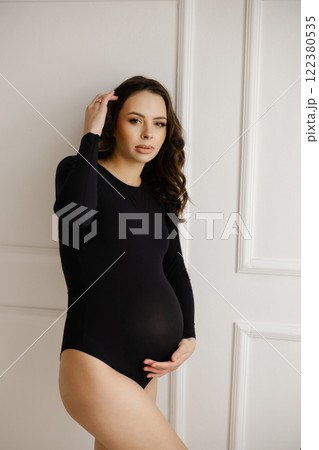 Expectant Mother Embracing Pregnancy Journey Expectant Mother Embracing Pregnancy Journey 122380535