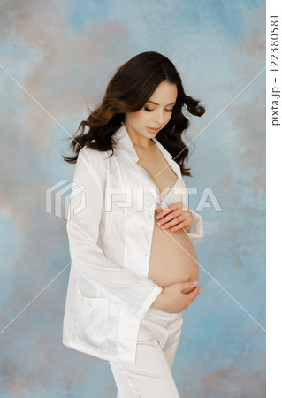 Expectant Mother Embracing Pregnancy Journey Expectant Mother Embracing Pregnancy Journey 122380581