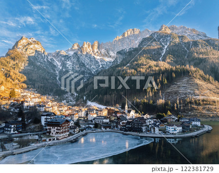 Aerial drone view of the Alleghe village, Italy in daylight 122381729