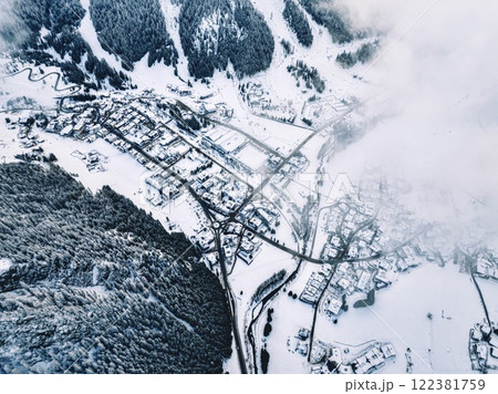 Aerial drone view of the Corvara village covered in snow Aerial drone view of the Corvara village covered in snow 122381759