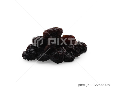 Heap of black raisins isolated on white background. 122384489
