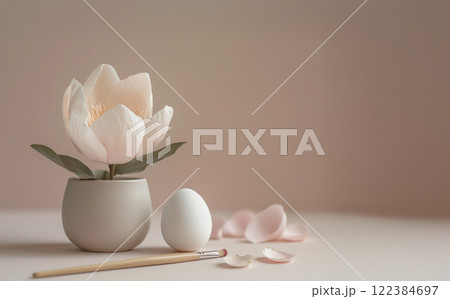 Minimalist Easter still life with a soft pastel egg and flowers Minimalist Easter still life with a soft pastel egg and flowers 122384697