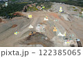 aerial view shot mining, dumpers, quarrying extractive industry stripping work. Big Mining Trucks. View from drone at opencast mining with lots of machinery trucks. High quality photo 122385065