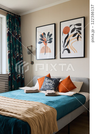 Contemporary and Stylish Modern Bedroom Featuring Artistic Decor Along with Cozy Textiles Contemporary and Stylish Modern Bedroom Featuring Artistic Decor Along with Cozy Textiles 122386137