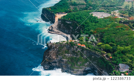 Engineering construction on the cliff near Uluwatu temple in Bali. 122386733