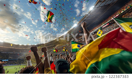 Exciting international soccer match at majestic stadium with fans holding country flags 122387383