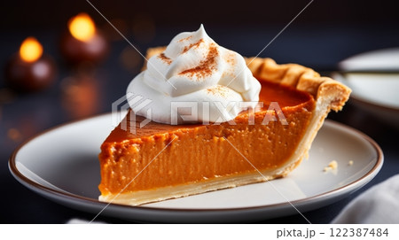 Delicious southern sweet potato pie similar to pumpkin pie on blurred white kitchen background 122387484
