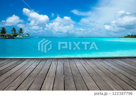 Maldives island with white sandy beach and sea 122387796