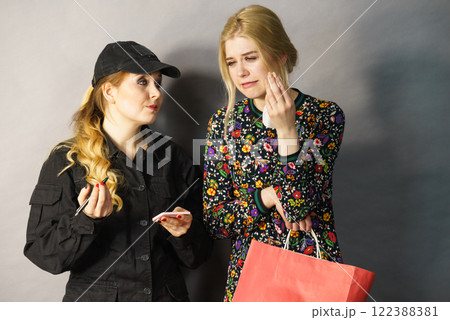 Security guard and shoplifter. Security guard and shoplifter. 122388381