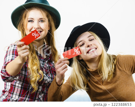 Two woman after sale shopping 122388653