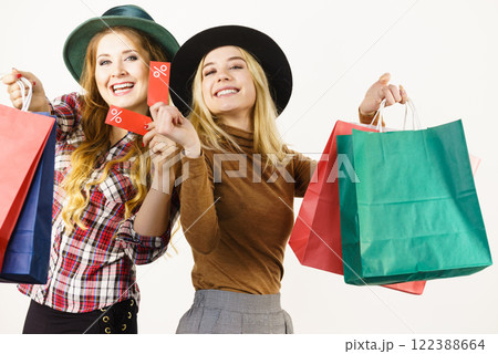 Two woman after sale shopping 122388664