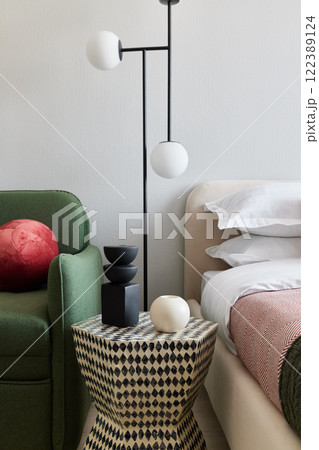 Discover a modern interior with stylish lighting and decor that enhance your living area 122389124