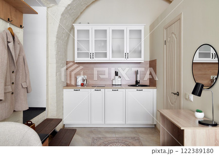 Discover a Modern Minimalist Kitchen featuring an Elegant and Sophisticated Design Concept 122389180