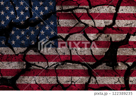 Cracked US flag. American flag painted on a cracked wall. Cracked US flag. American flag painted on a cracked wall. 122389235