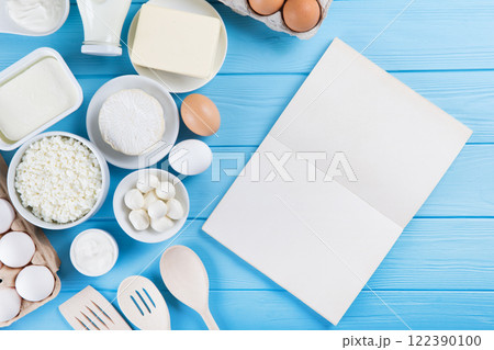 dairy products on blue wooden background, top view dairy products on blue wooden background, top view 122390100