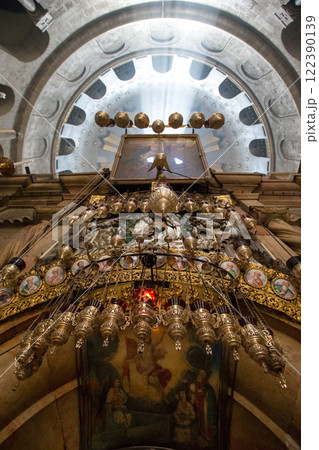 JERUSALEM, ISRAEL - FEBRUARY 16, 2015: Tourists waiting in long rows to enter Aedicule in Church of the Holy Sepulchre JERUSALEM, ISRAEL - FEBRUARY 16, 2015: Tourists waiting in long rows to enter Aedicule in Church of the Holy Sepulchre 122390139