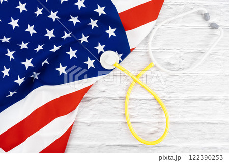 United States America healthcare medical concept - stethoscope on American flag United States America healthcare medical concept - stethoscope on American flag 122390253