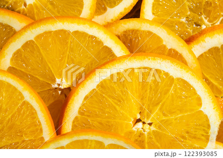 Juicy orange background made from sliced orange 122393085