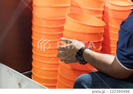 The skill operator working with plastic injection blow parts. The skill operator working with plastic injection blow parts. 122393498