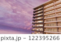 夕焼けに染まるマンション 122395266