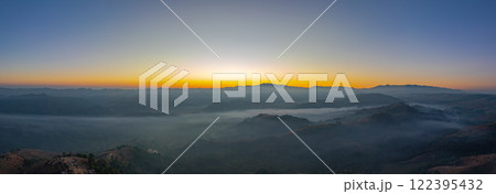 Aerial View of sweet sky in Sunrise in the valley over mist. 122395432