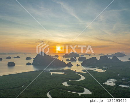 Aerial view colorful sky at sunrise over Samet Nang Chee viewpoint. Aerial view colorful sky at sunrise over Samet Nang Chee viewpoint. 122395433