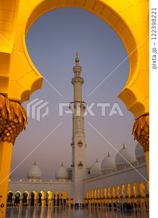 Minaret of Sheikh Zayed Bin Sultan Al Nahyan Mosque Framed by an Opening at Night 122398221