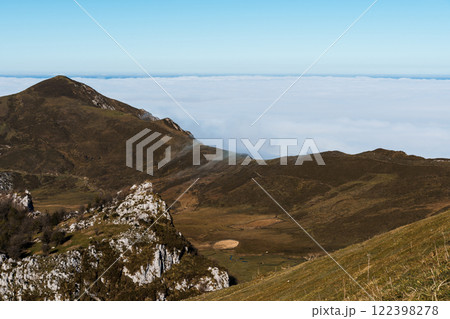 Mountain Valley in Clouds 122398278