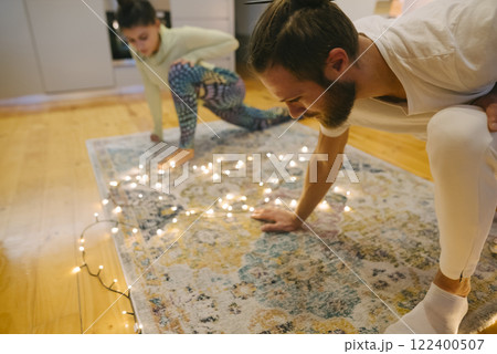 Enjoy Cozy Family Moments Together with Fairy Lights and Playful Spirits This Season 122400507