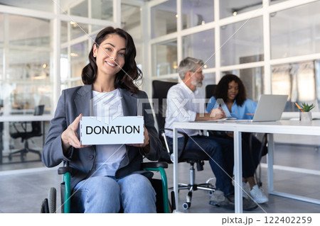 Disabled handicapped businesswoman asking donation for peoples with disabilities Disabled handicapped businesswoman asking donation for peoples with disabilities 122402259