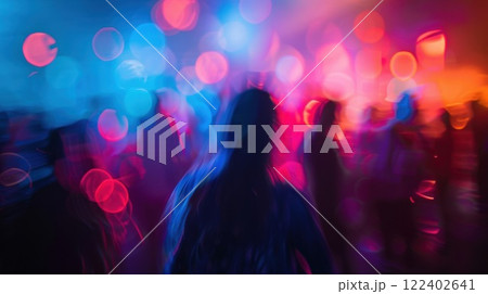 The blur of music lights and people comes together to create an unforgettable sensory experience 122402641