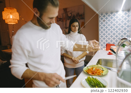 Spend a Delightful and Cozy Evening Cooking Together in an Exquisite Modern Kitchen Space 122402930