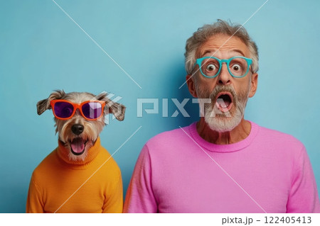 Middle aged man is shocked and amused by a dog in sunglasses on a blue background 122405413