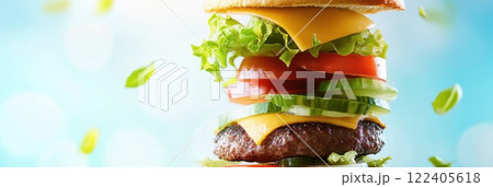 Layers of a delicious burger floating in mid air with vibrant colors and fresh ingredients 122405618