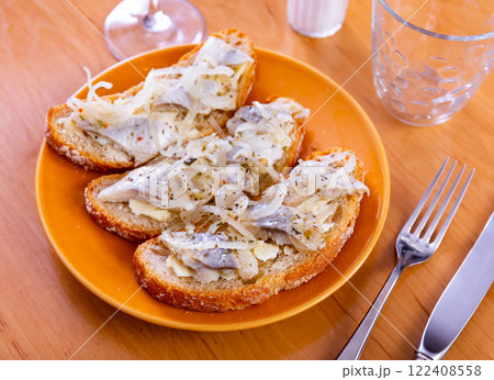 Sandwich with herring fish and butter 122408558
