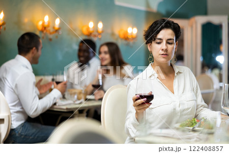 Woman at the restaurant Woman at the restaurant 122408857