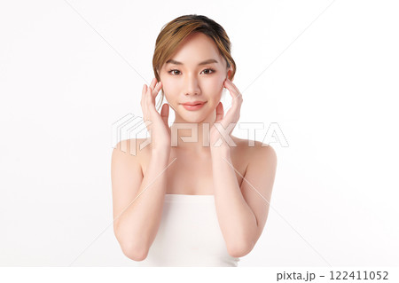 Beautiful young asian woman with clean fresh skin on white background, Face care, Facial treatment, Cosmetology, beauty and spa, Asian women portrait. Beautiful young asian woman with clean fresh skin on white background, Face care, Facial treatment, Cosmetology, beauty and spa, Asian women portrait. 122411052
