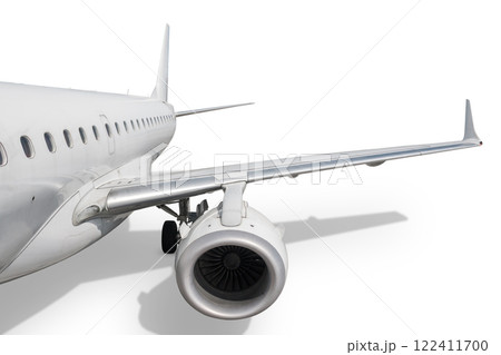 Passenger airliner isolated on white background. View of the wing and rear jet plane 122411700