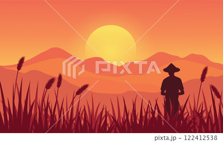 Farmer Silhouette in Mountains Rice Field Landscape with Golden Sun at Sunrise Sunset 122412538