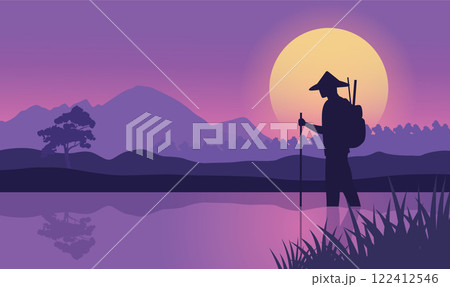 Farmer Silhouette in Mountains Rice Field Landscape with Sun at Sunrise Sunset in Purple Sky Farmer Silhouette in Mountains Rice Field Landscape with Sun at Sunrise Sunset in Purple Sky 122412546