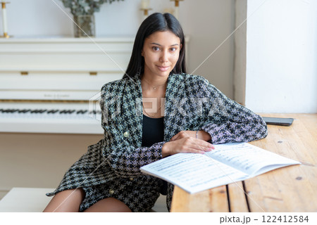 Woman with musical notes music literacy student or teacher Woman with musical notes music literacy student or teacher 122412584
